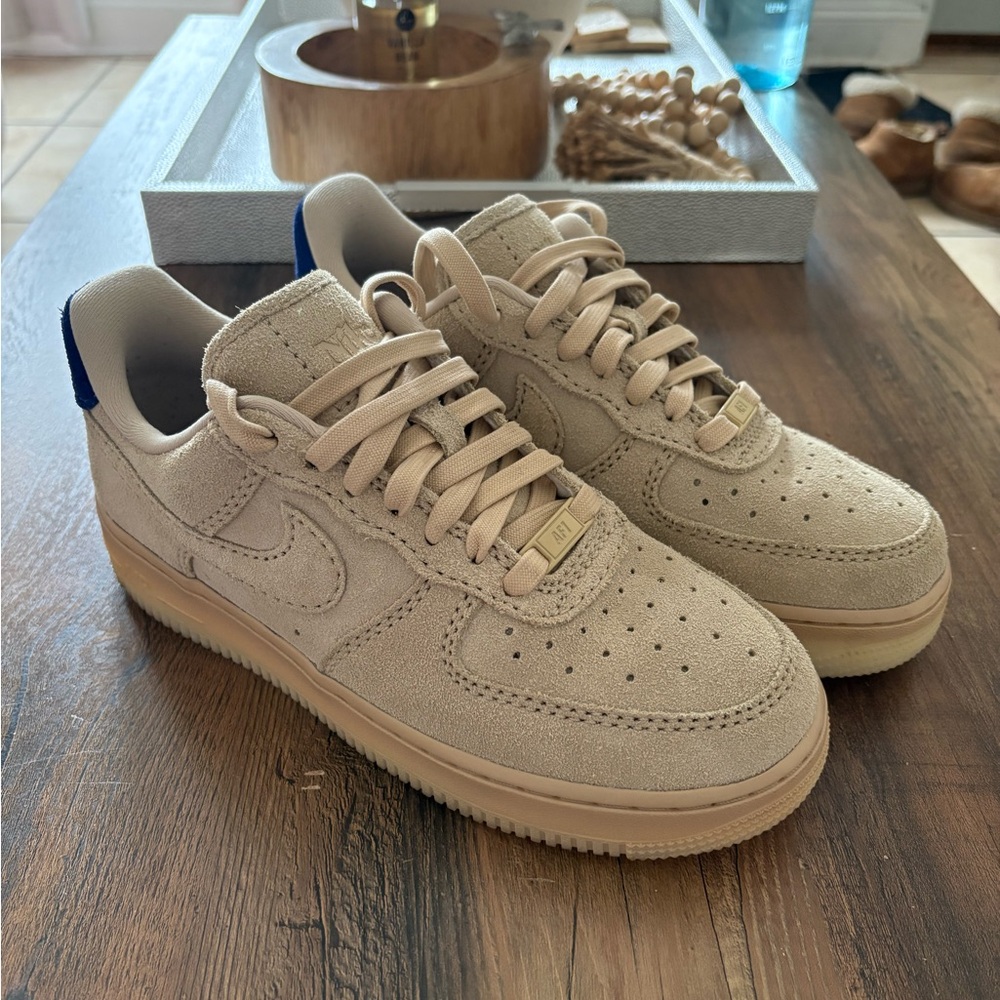 Nike Suede Low-Top Sneakers in Beige with Blue Heel Tab